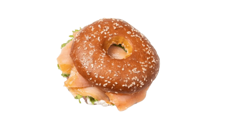 Bagel con salmone affumicato, formaggio fresco e rucola