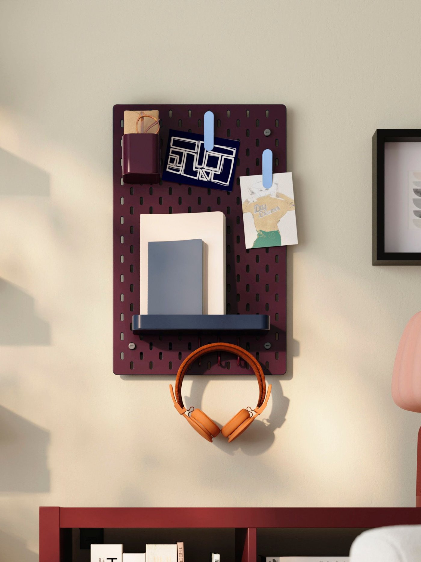 A multicolour SKÅDIS 7-piece accessories set in the living room