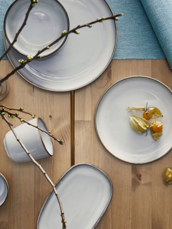 A grey GLADELIG side plate