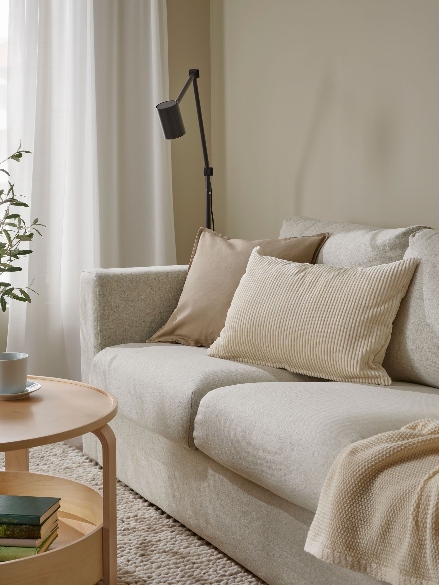 A Gunnared beige VIMLE 3-seat sofa in the living room