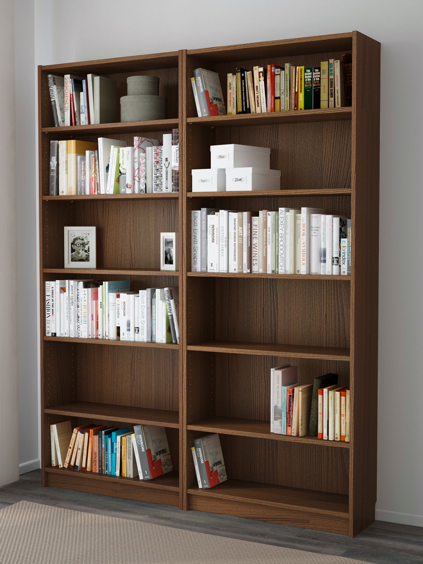 A brown BILLY bookcase with books in it