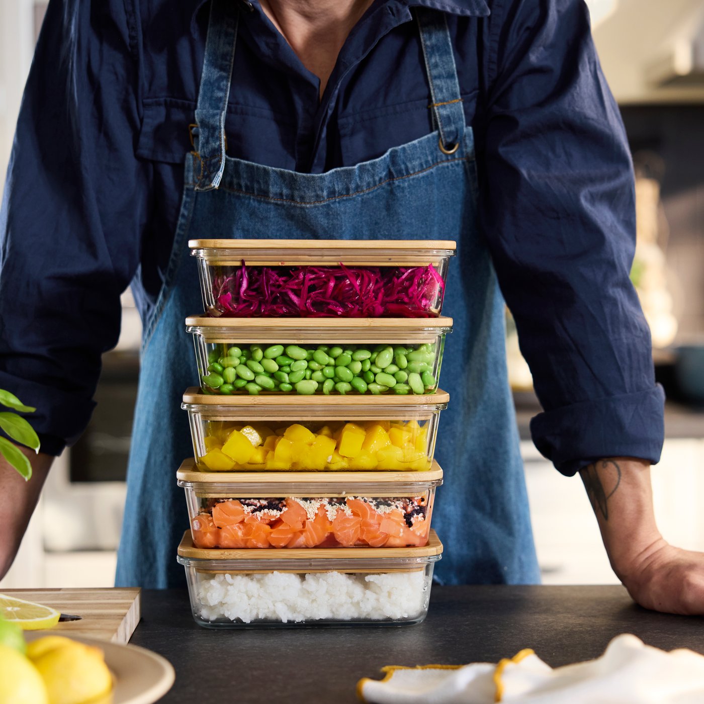 A white/dark yellow SANDABBORRE tea towel in the kitchen