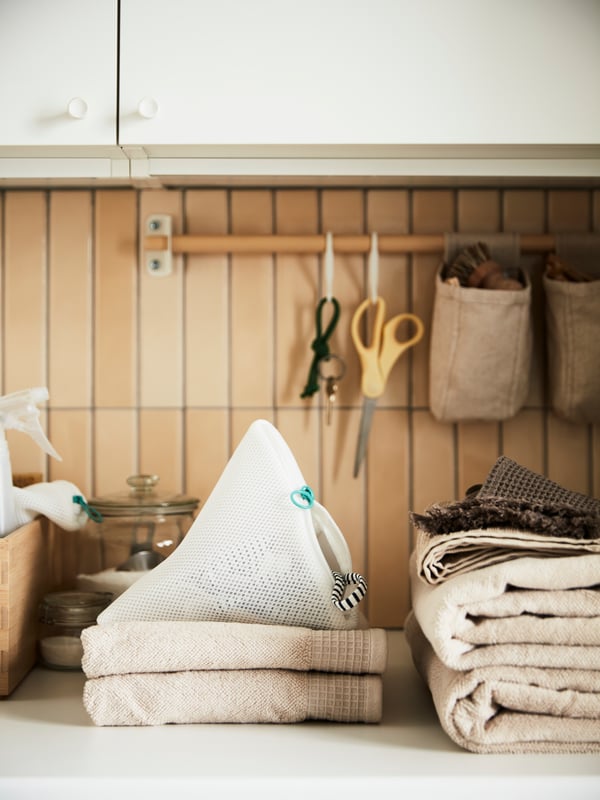 A white SLIBB washing bag in the bathroom