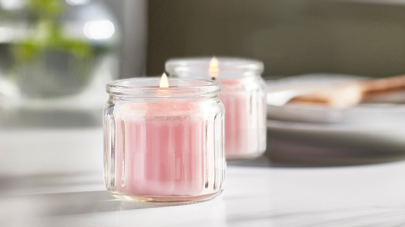 A Jasmine/pink LUGNARE scented candle in glass