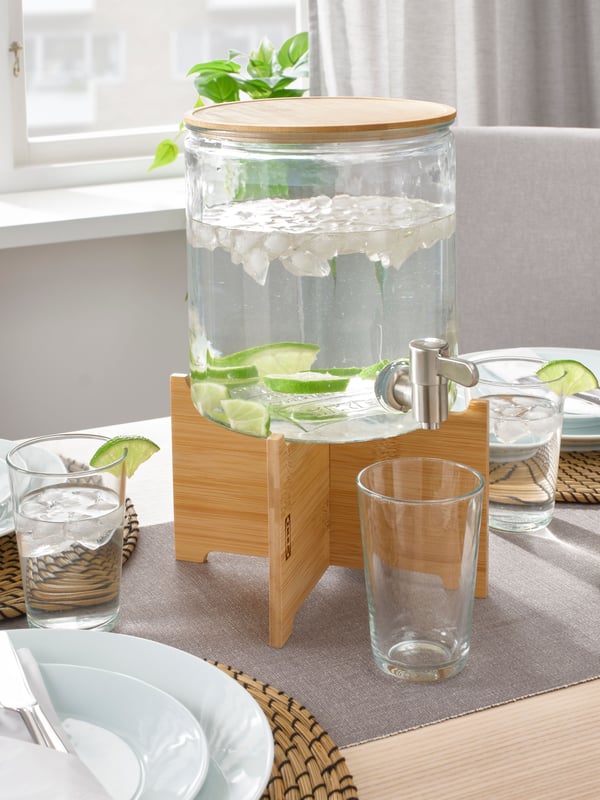 A bamboo/clear glass IKEA 365+ jar with tap
