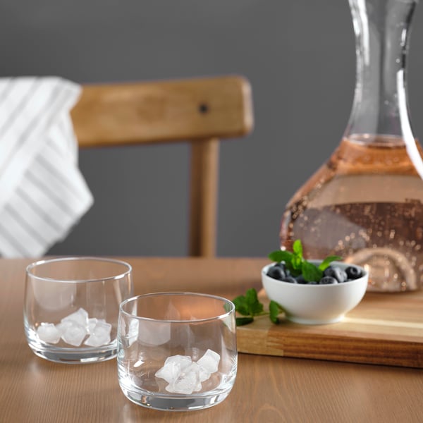 A clear glass STORSINT whiskey glass