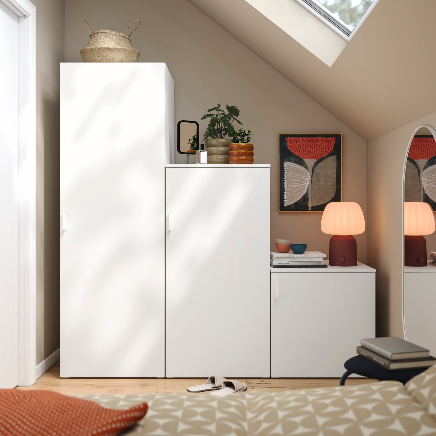 A white/Fonnes white PLATSA wardrobe with 3 doors in the bedroom