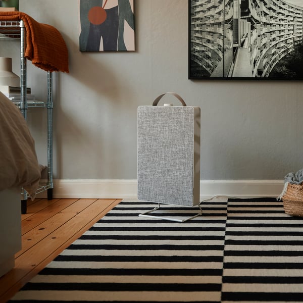 A white FÖRNUFTIG air purifier