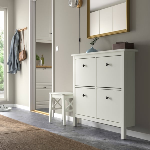 A white HEMNES shoe cabinet with 4 compartments