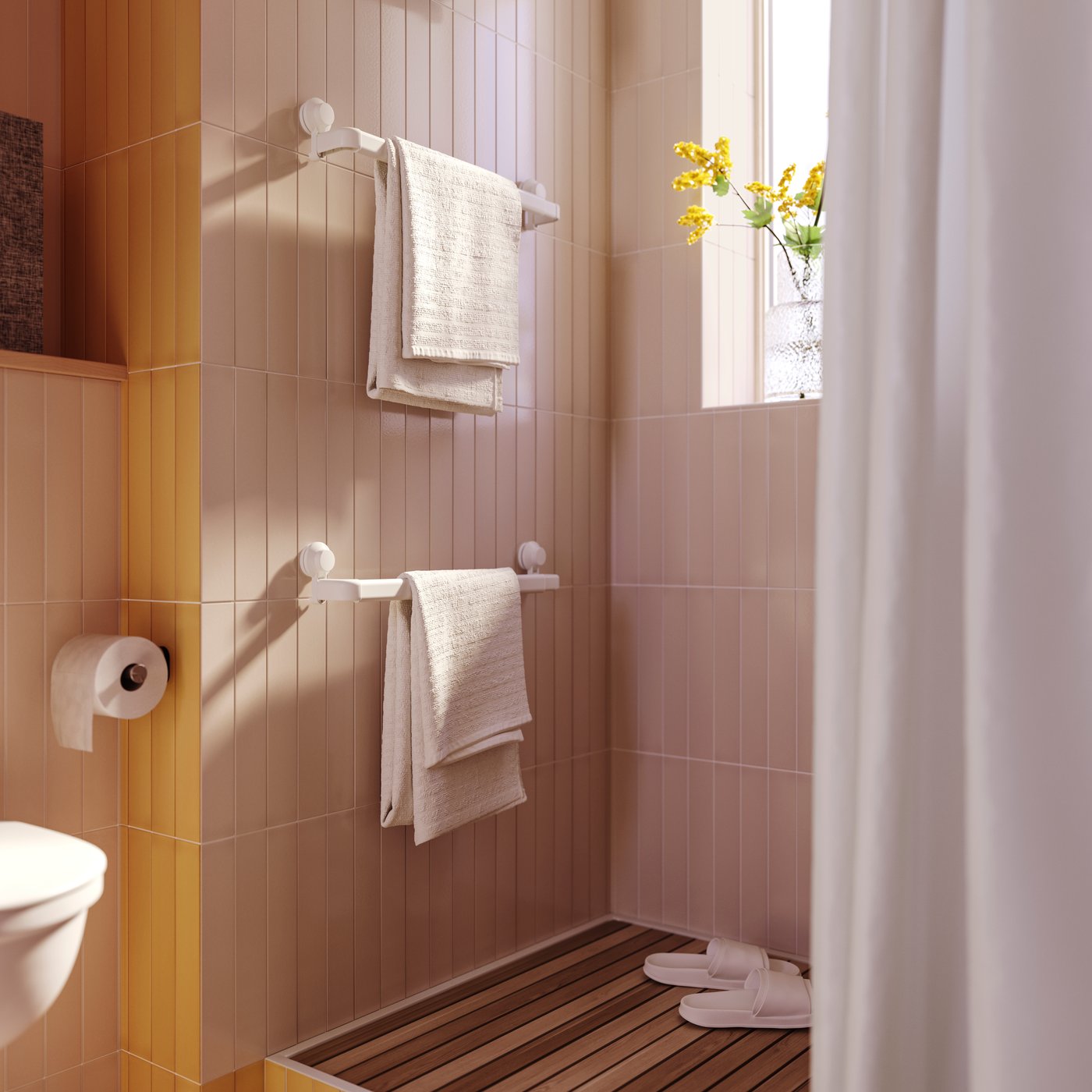 Yellow SMYCKA artificial flowers on a windowsill in the bathroom