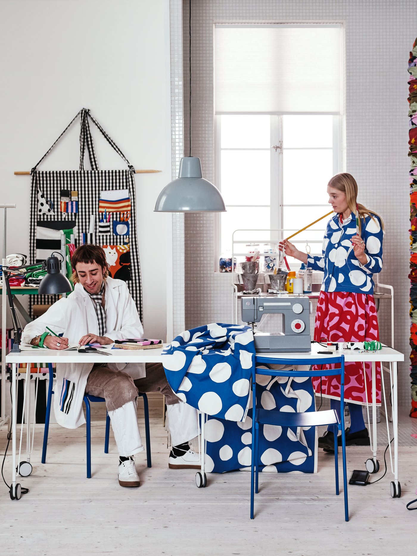 A turquoise SKURUP pendant lamp