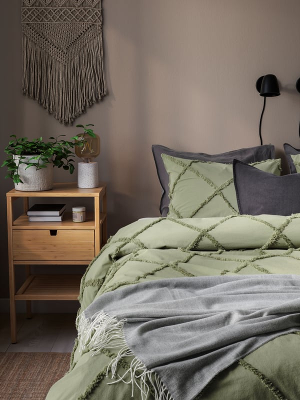 A black SKURUP wall lamp