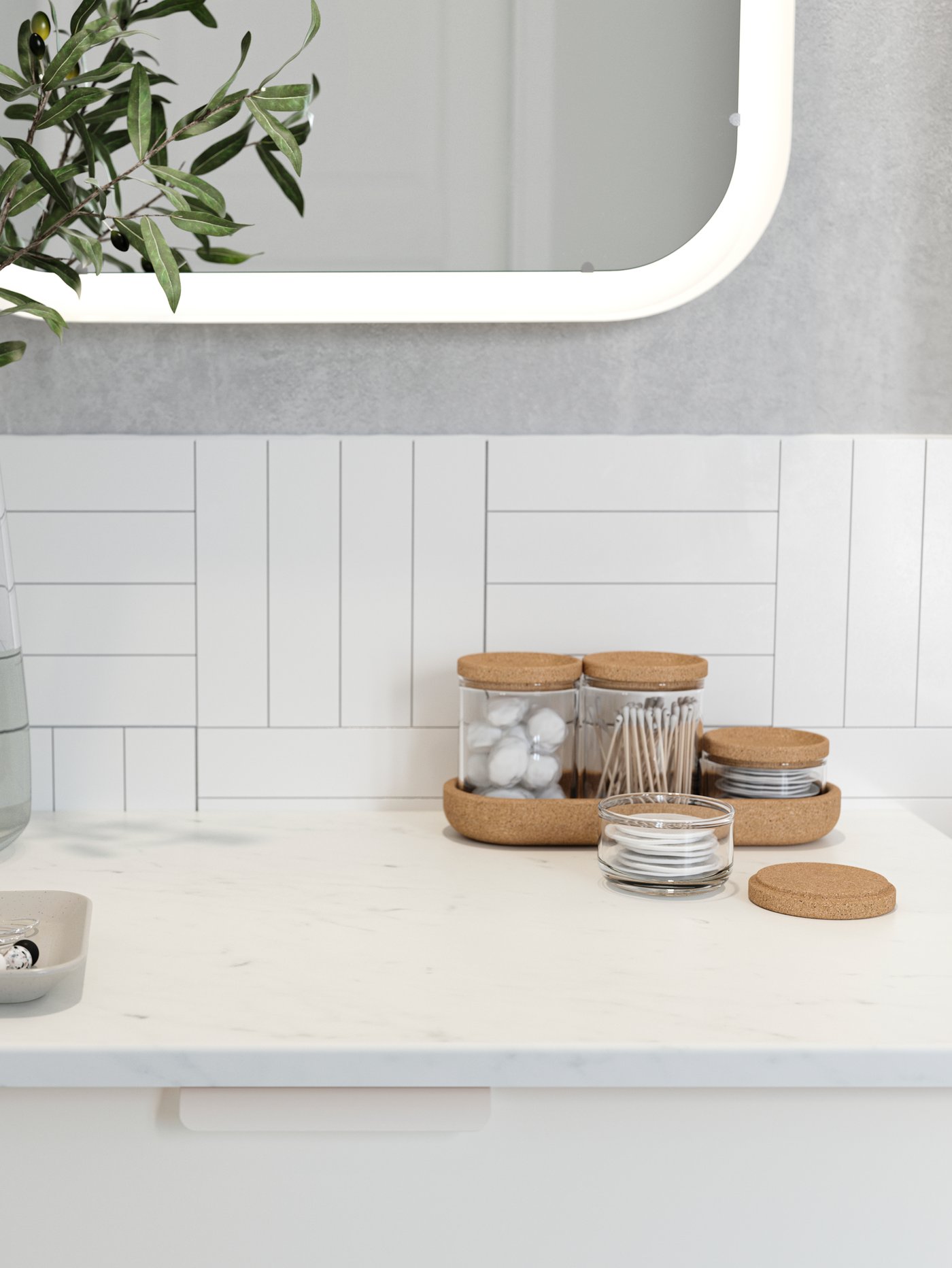 Cuarto de baño con un juego de cinco tarros con tapa colocados sobre una encimera blanca, con un espejo rectangular encima.