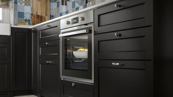 An IKEA 500 stainless steel ANRÄTTA forced air oven in the kitchen