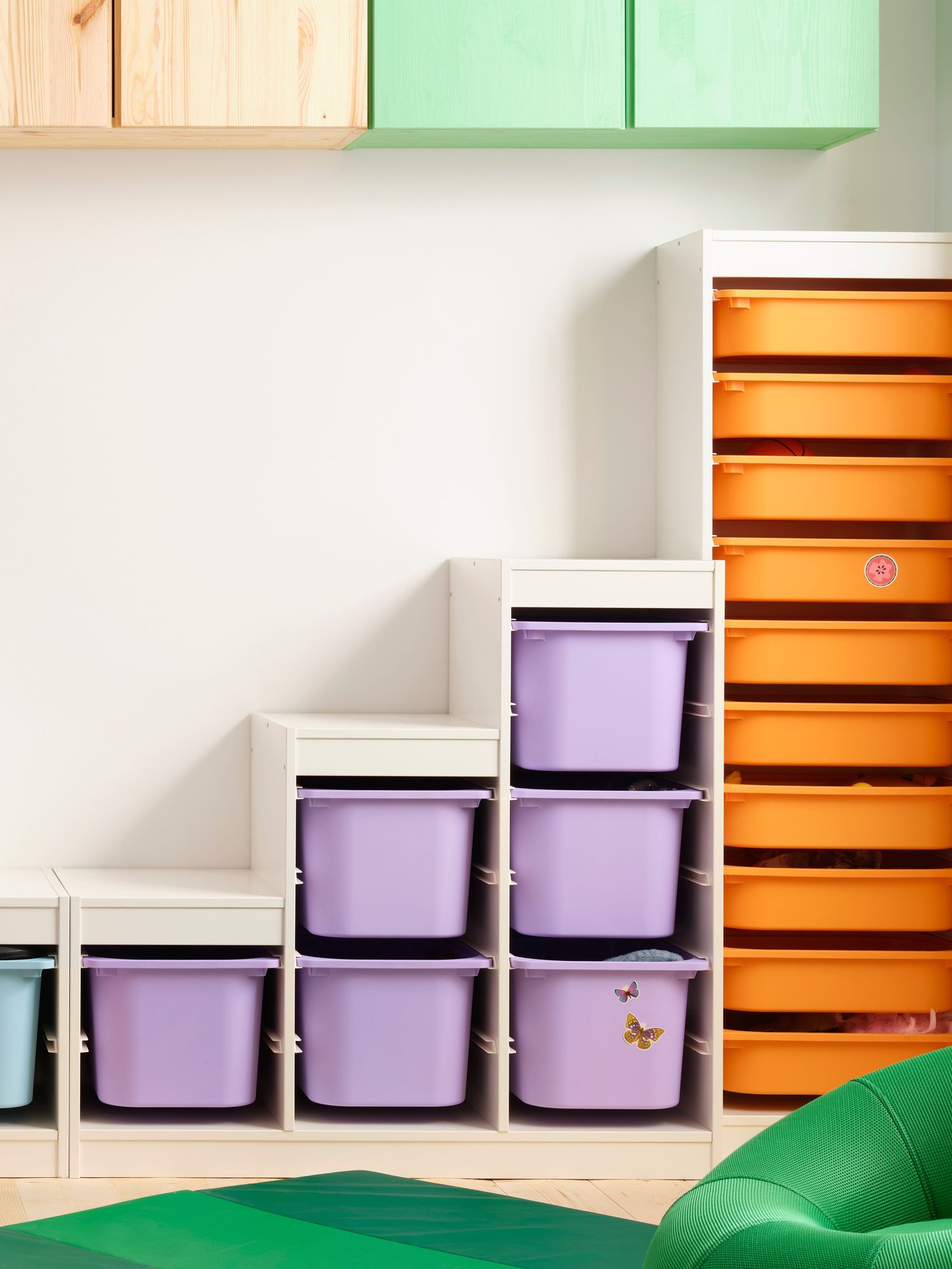 A light white stained pine TROFAST wall storage in the childrens room