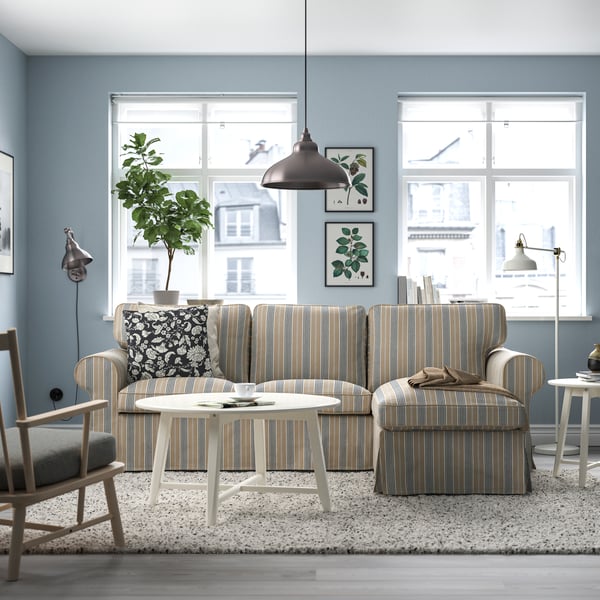 A Karlshov beige/multicolour EKTORP 3-seat sofa with chaise longue