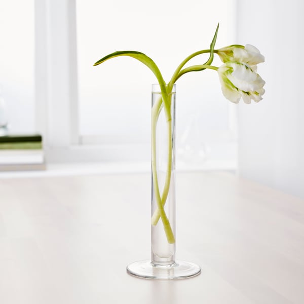 A clear glass TAJT vase