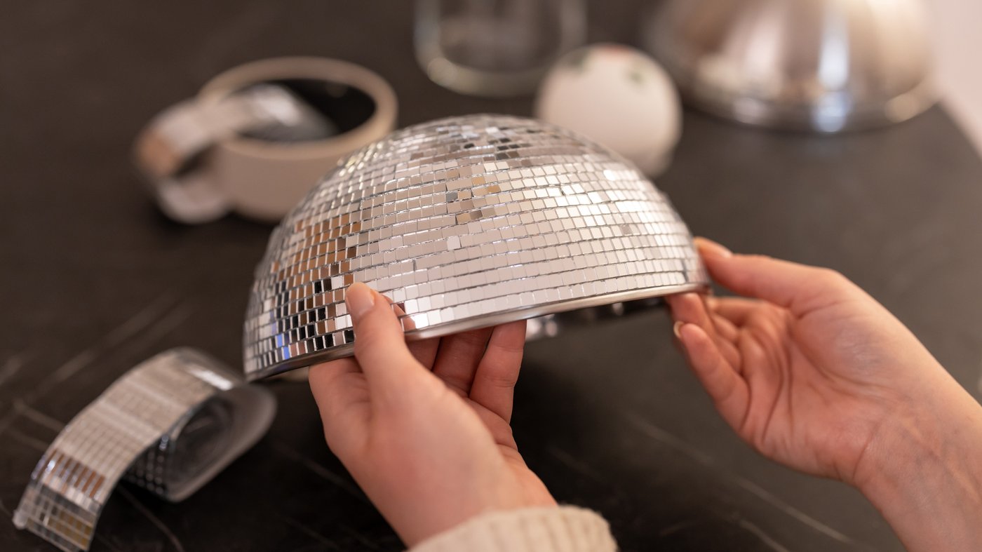 Decorate a bowl with disco stickers or mirror mosaic tiles for a fun disco ball effect.