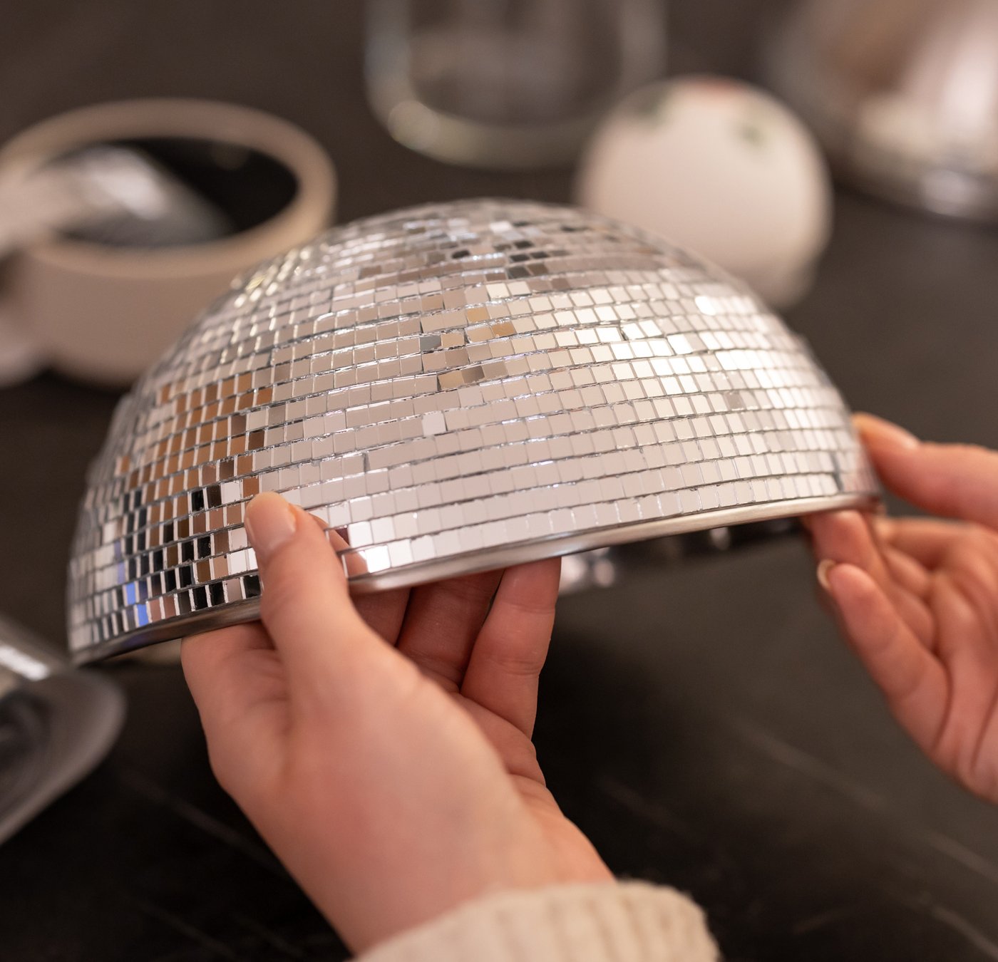 Decorate a bowl with disco stickers or mirror mosaic tiles for a fun disco ball effect.