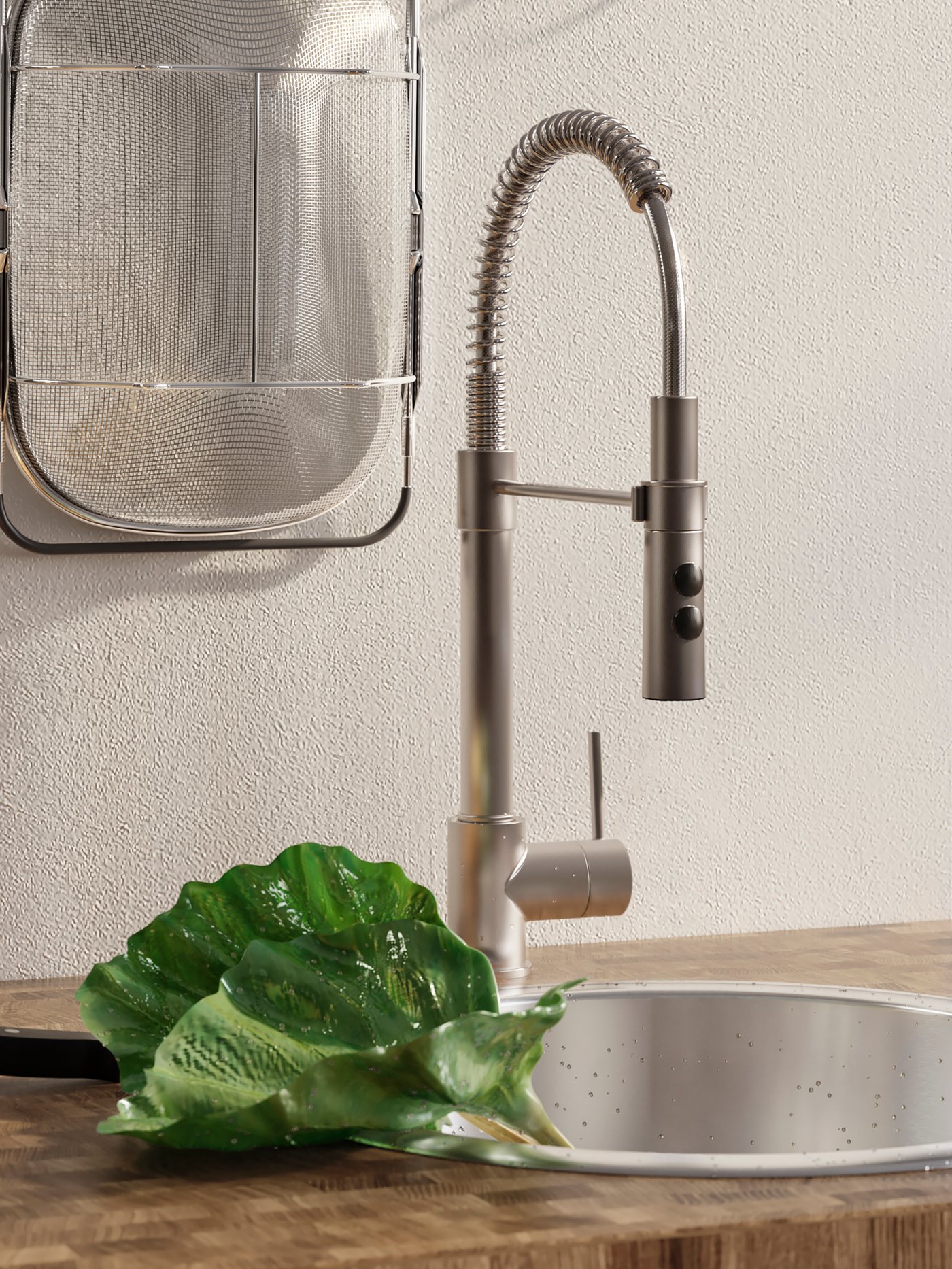 Hand adjusts the water flow of a GLYPEN kitchen tap in stainless steel next to a TÅRTSMET dish-washing brush.
