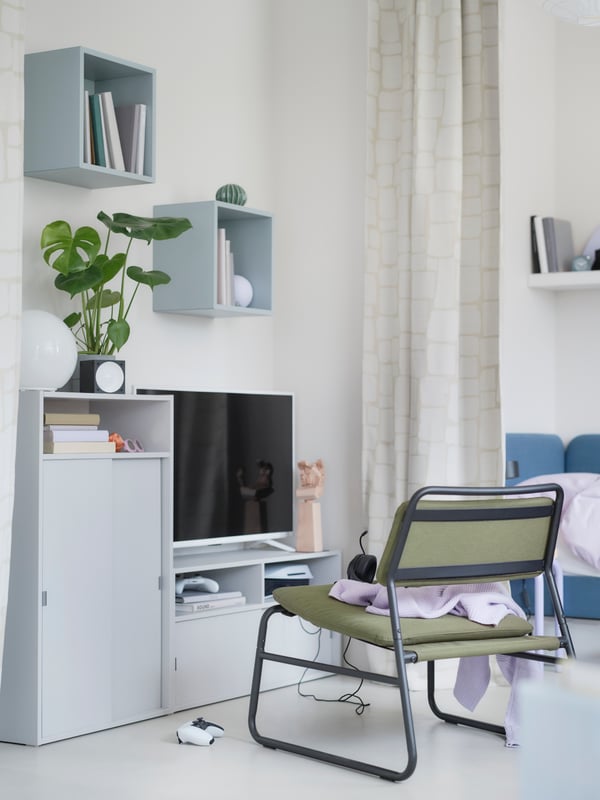 A light grey SPIKSMED cabinet