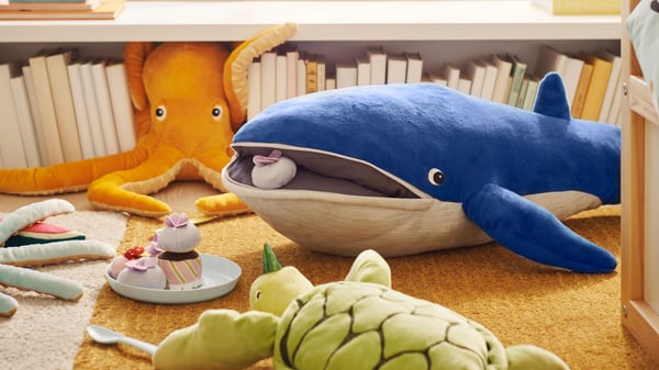 a child's room with BLAVINGAD ocean soft toys; a turtle, whale, and octopus 