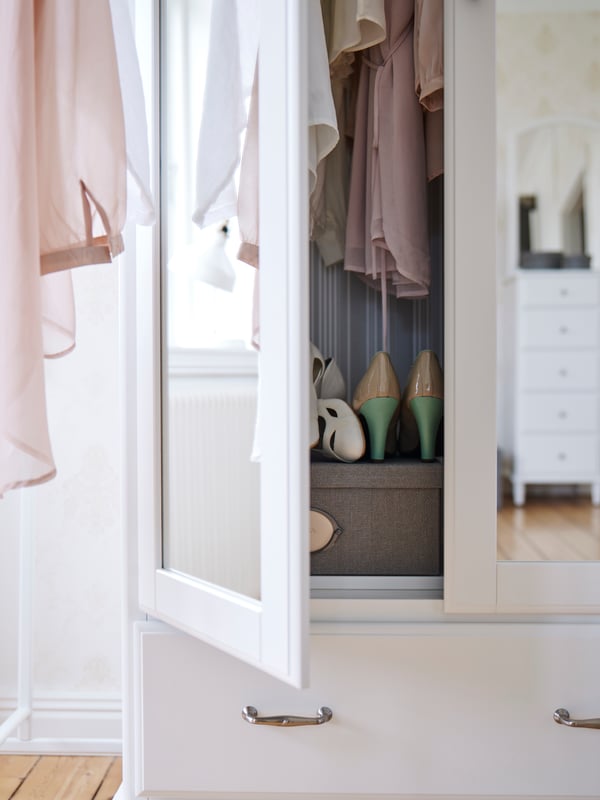 A white/mirror glass TYSSEDAL wardrobe