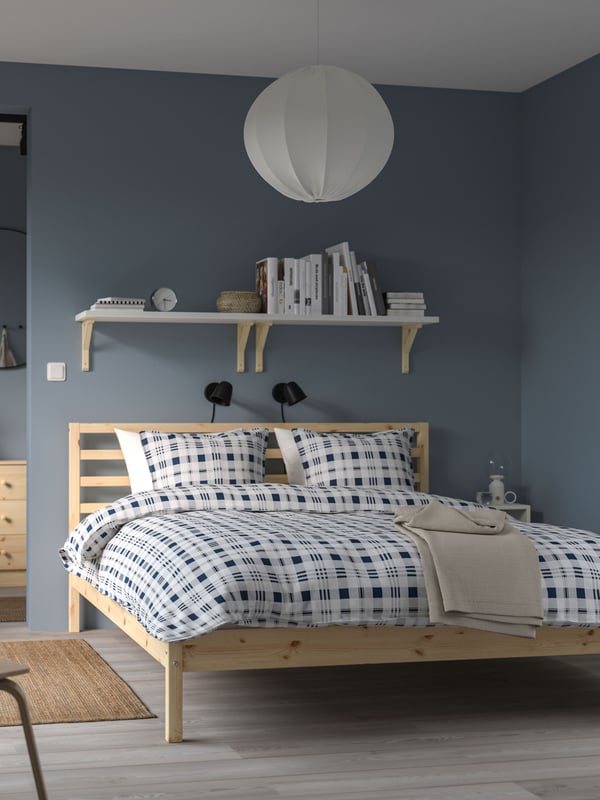 A pine TARVA bed frame