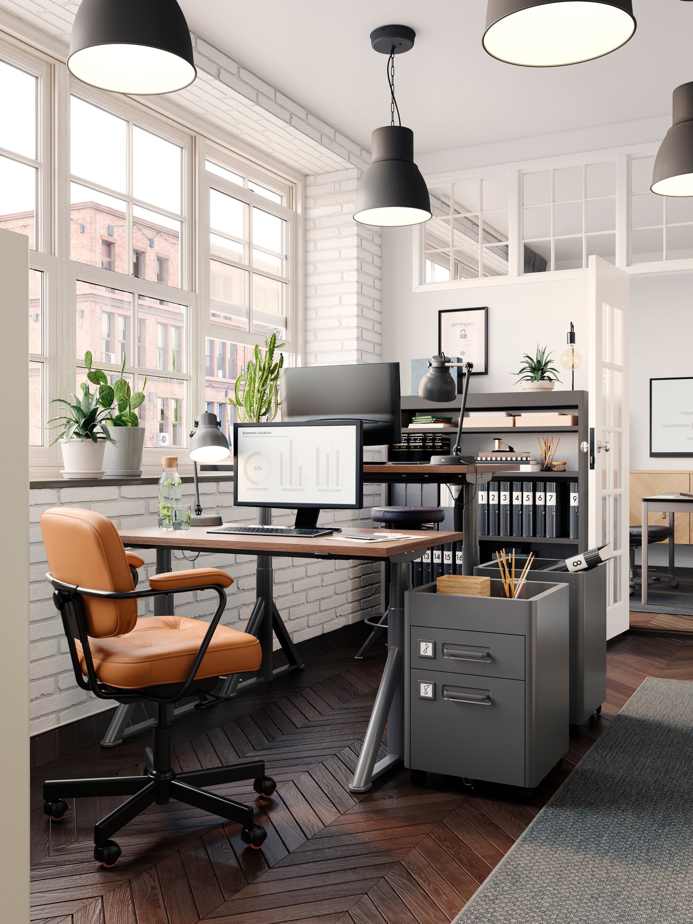 Una cassettiera IDÅSEN grigio scuro su rotelle