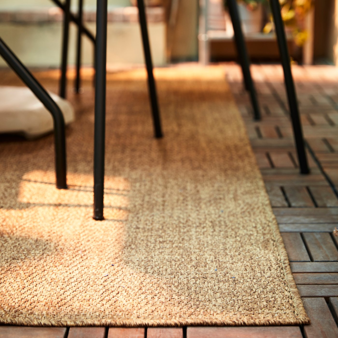 Rug on tiled outdoor space
