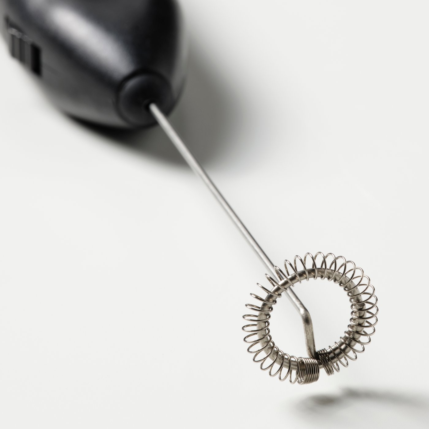 A black PRODUKT milk-frother