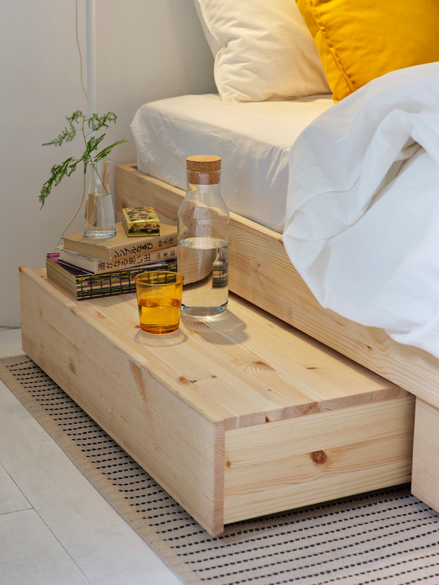 A pine GLAMBERGET extendable bed with storage