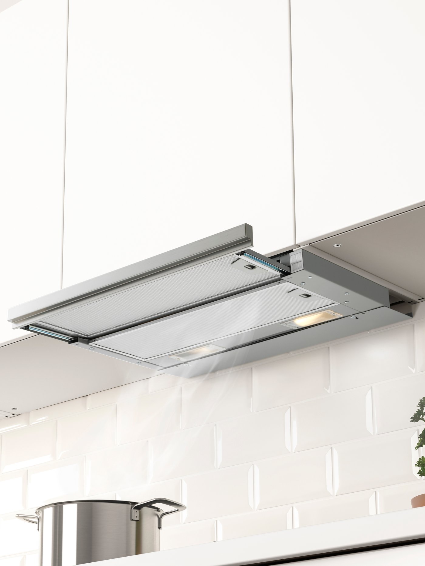 A stainless steel UTDRAG built-in extractor hood
