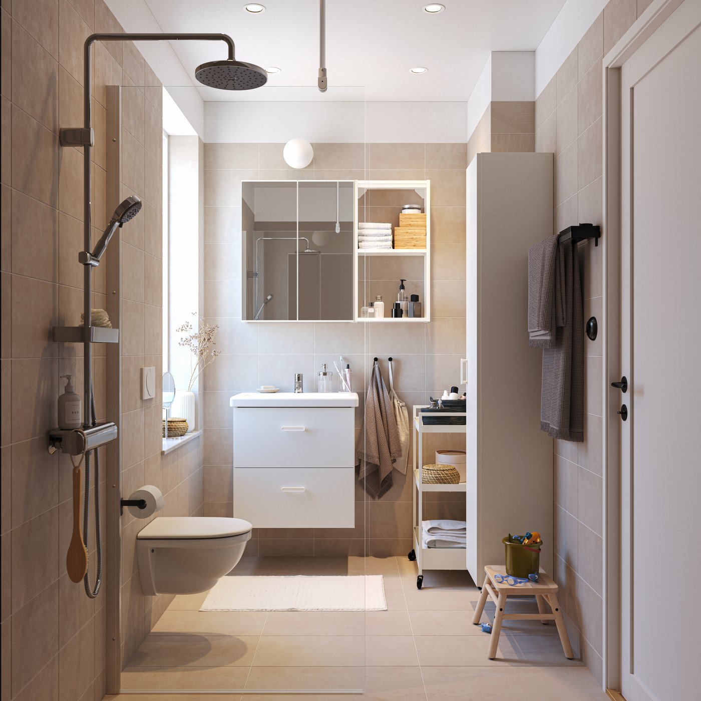 A bathroom with an ENHET washbasin, ENHET wall cabinet and BROGRUND shower.