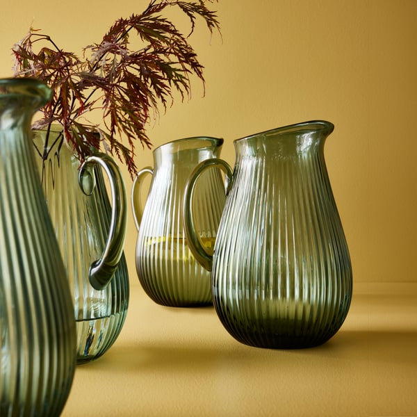 A patterned/dark grey-green VARDAGEN jug