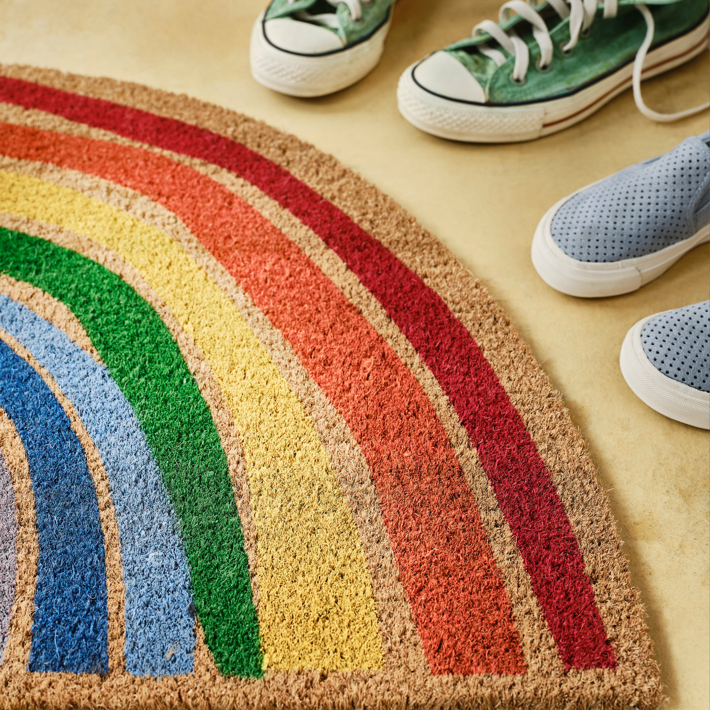 A rainbow PILLEMARK door mat, indoor in the hallway