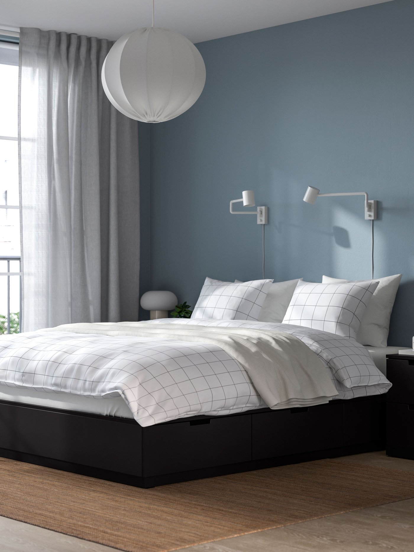 An anthracite NORDLI bed frame with storage