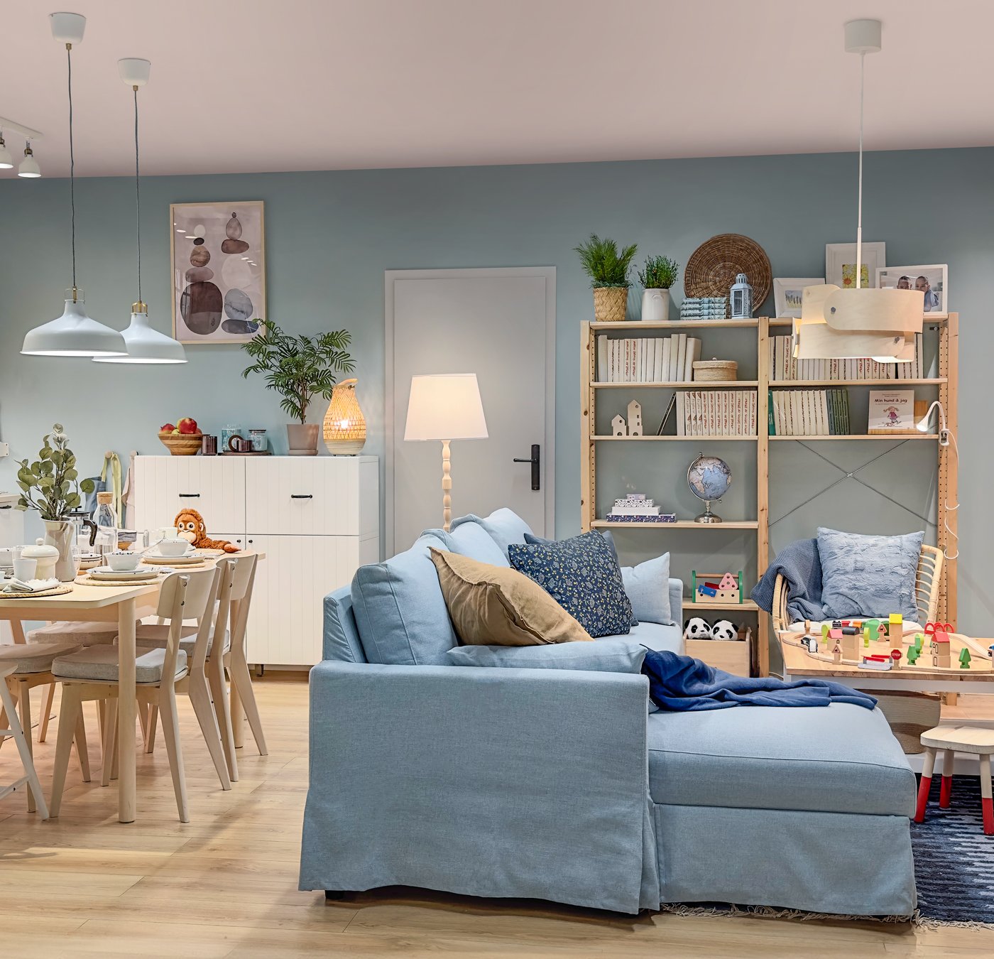 An off-white RANARP pendant lamp in the living room