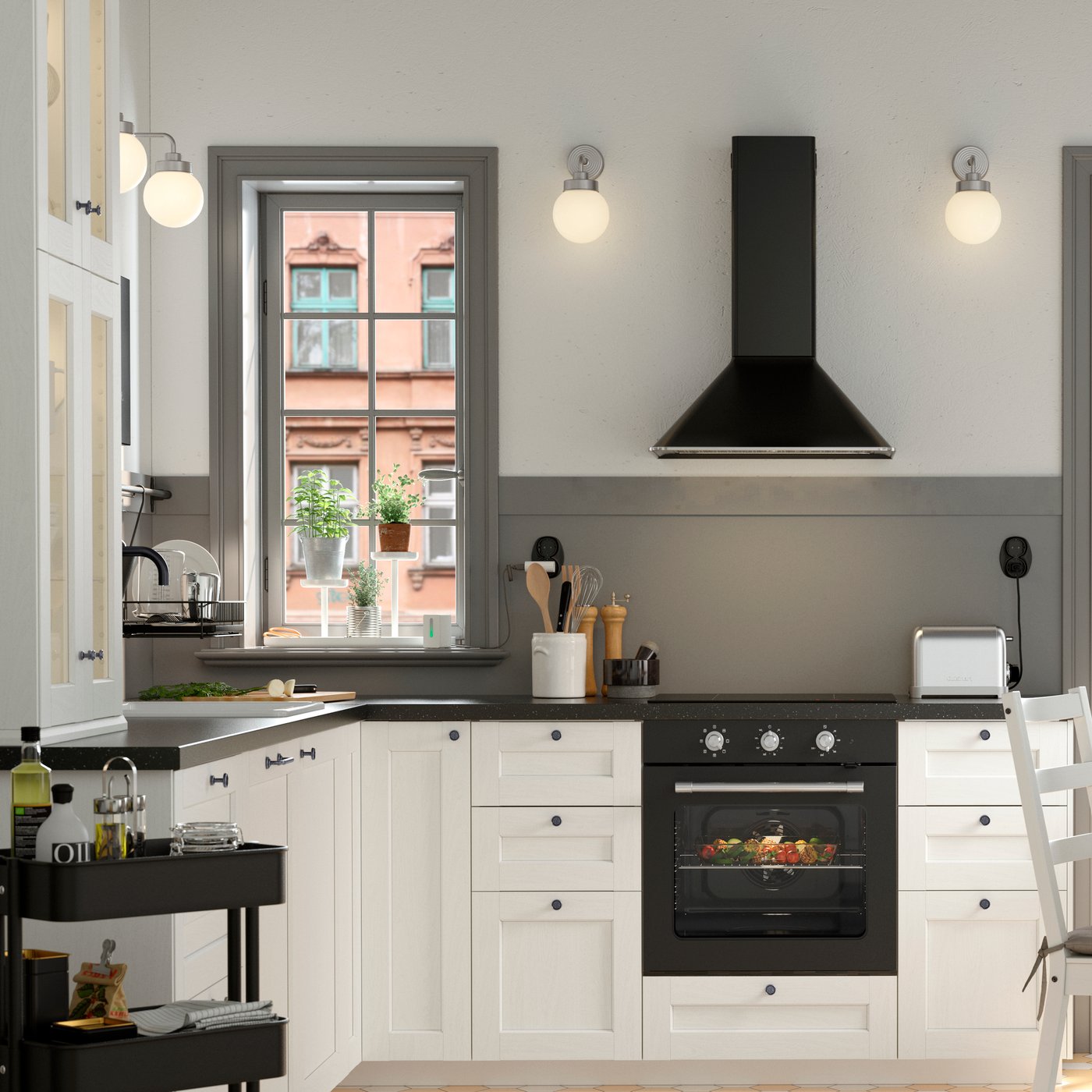 A white NORDVIKEN extendable table in the kitchen