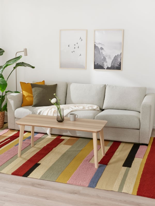 A handmade multicolour/red BRÖNDEN rug, low pile in the living room