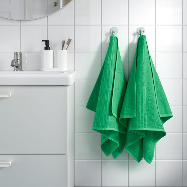A bright green VÅGSJÖN hand towel
