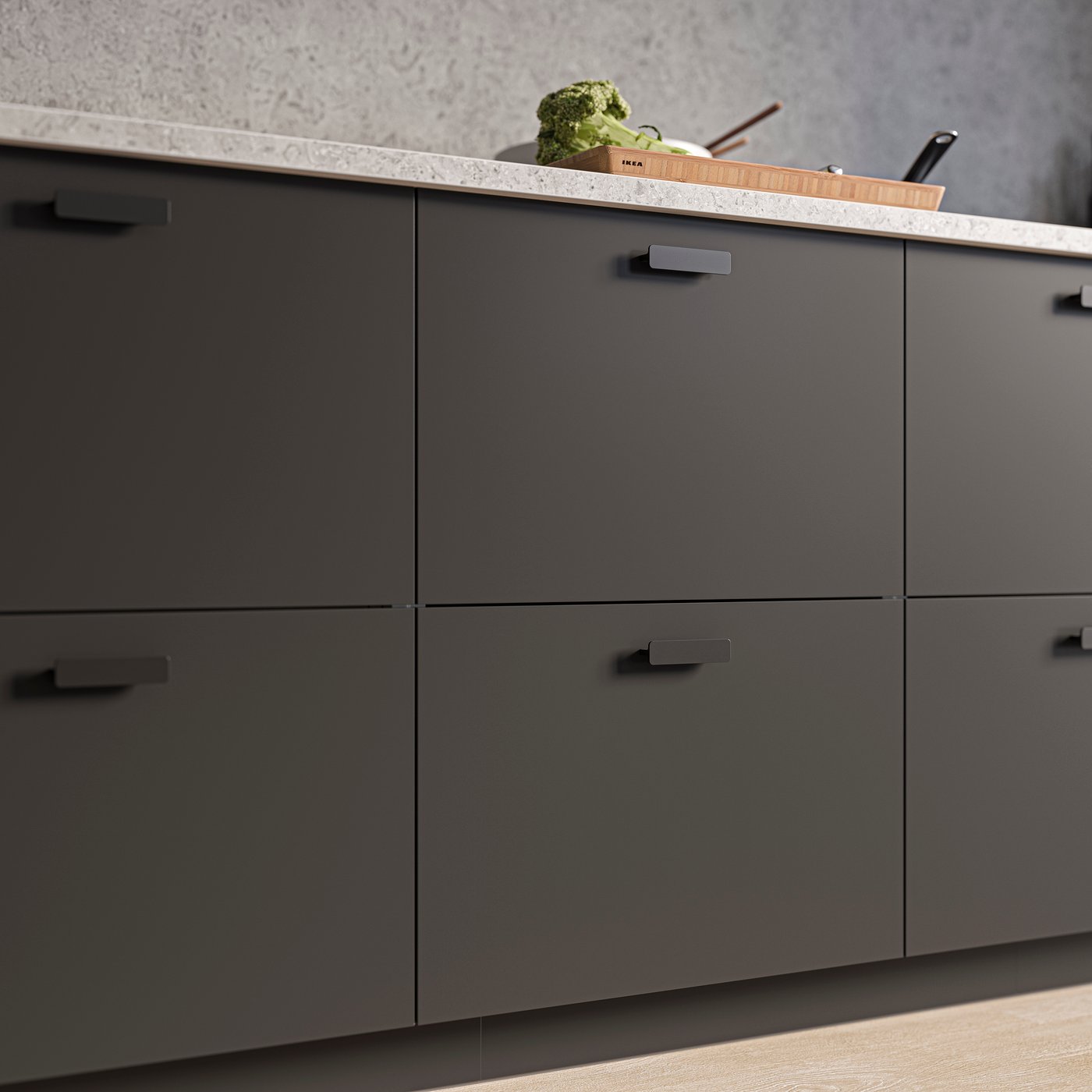 Køkkenskuffer med matte grå fronter i antracitgrå.