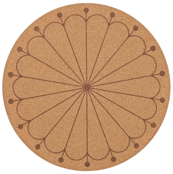 A cork/patterned SVARTVIDE place mat