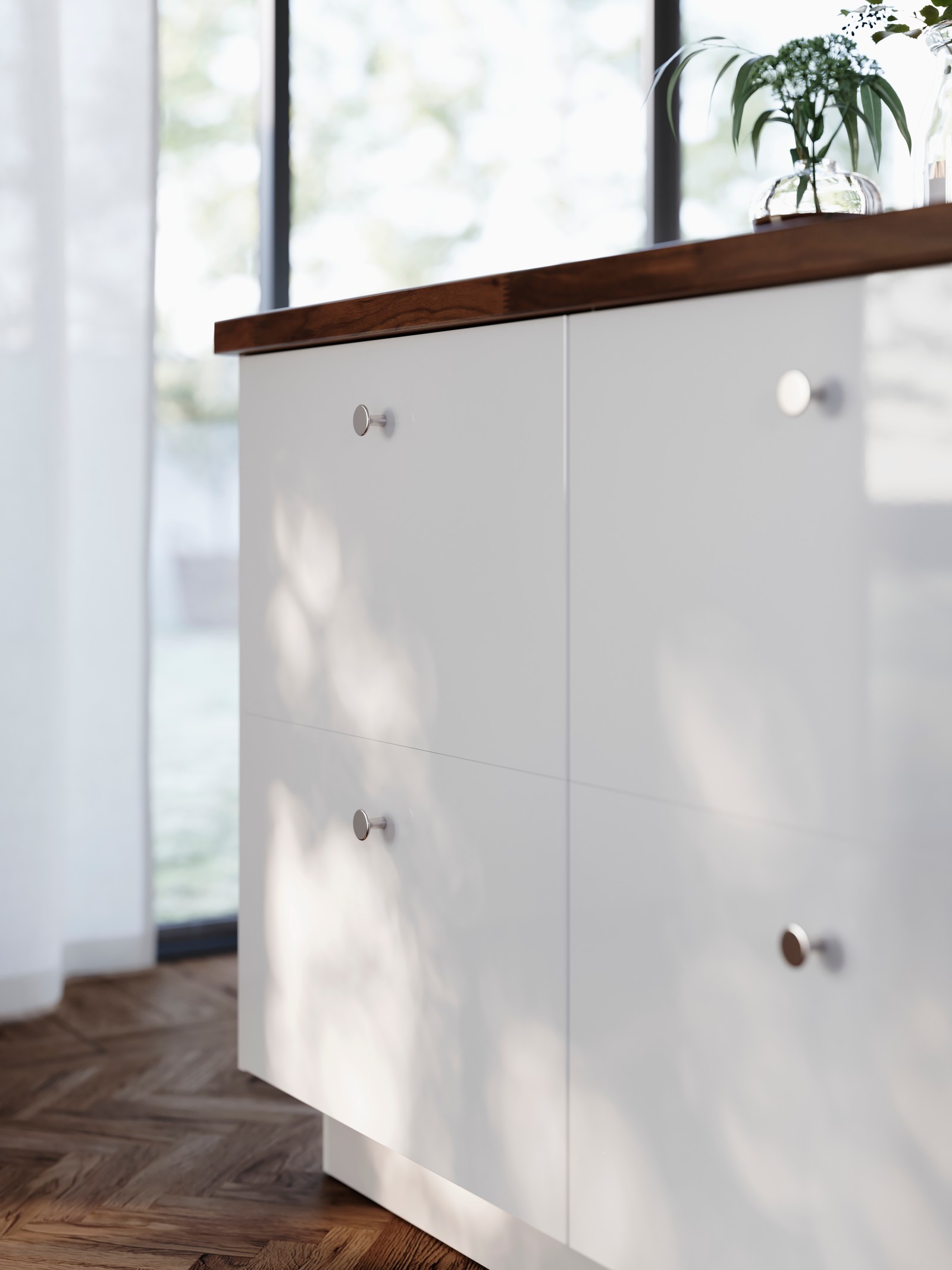 A kitchen with white high-gloss kitchen cabinets - IKEA CA