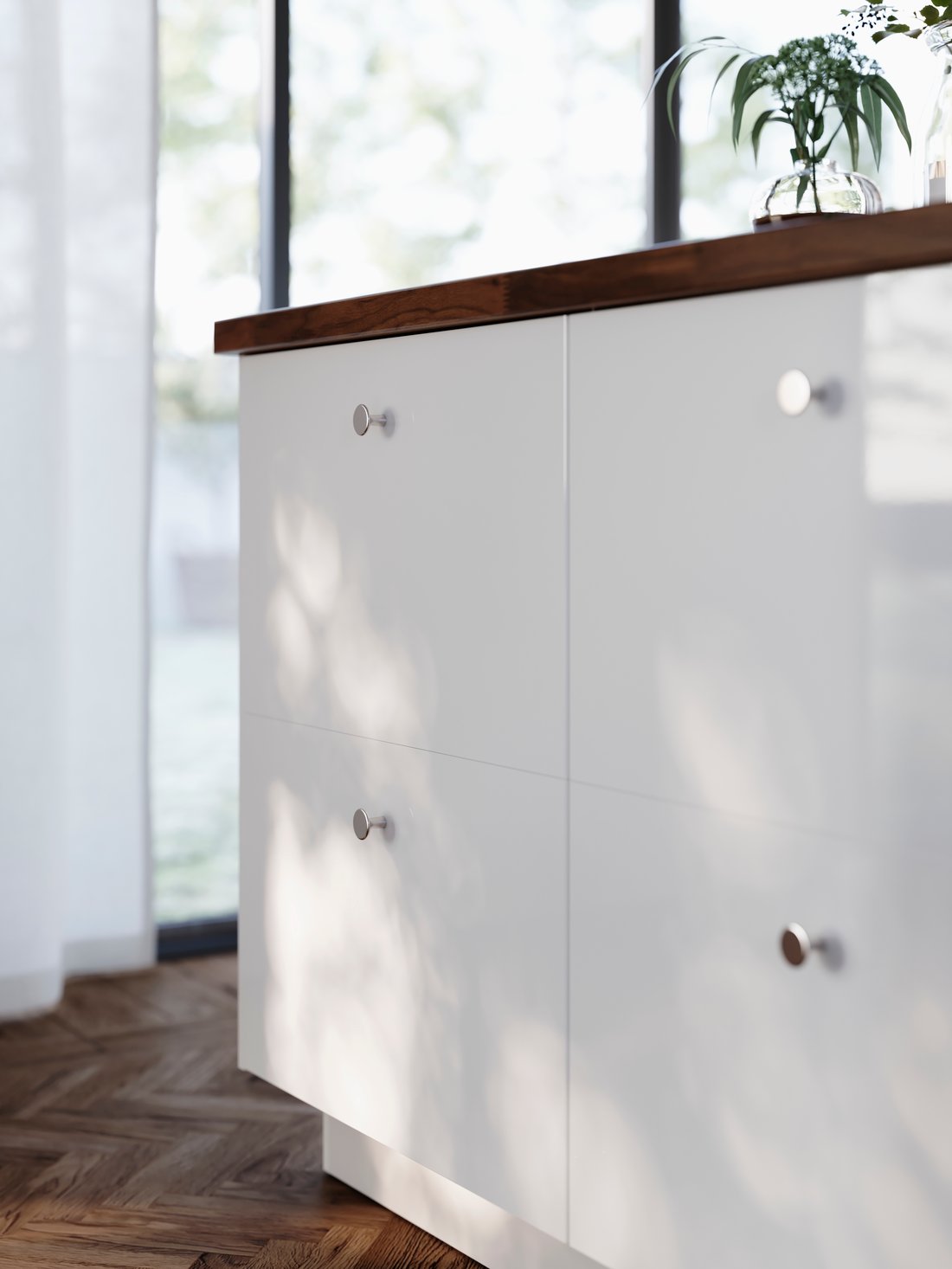 A kitchen with white high-gloss kitchen cabinets - IKEA CA