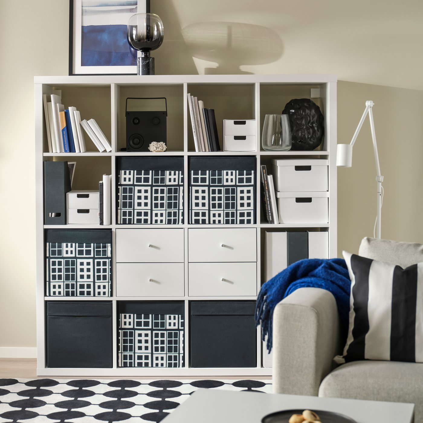 KALLAX white shelving unit with inserts in the living room.