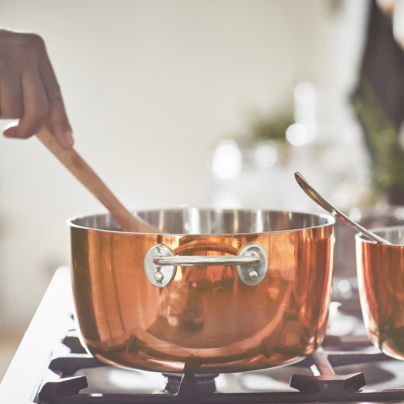 A copper/stainless steel FINMAT pot with lid
