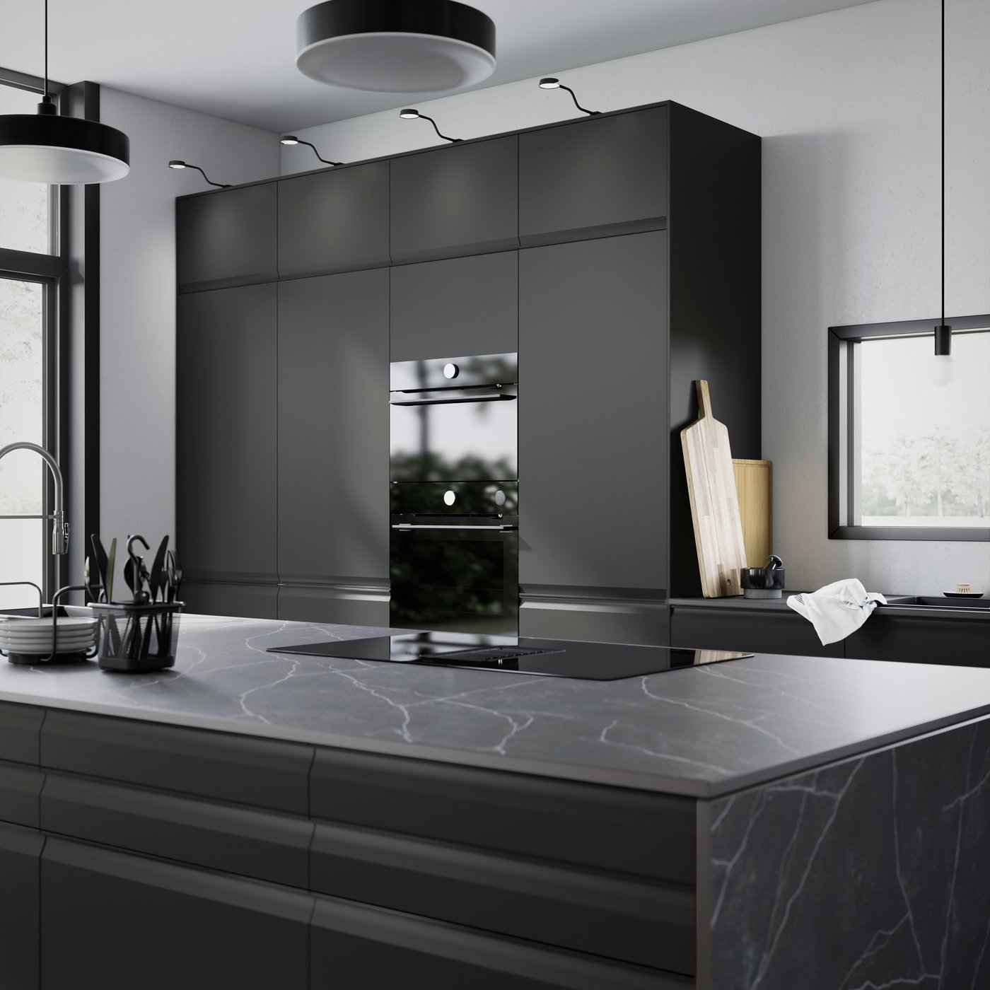 A kitchen with matt anthracite UPPLÖV fronts and high cabinets.