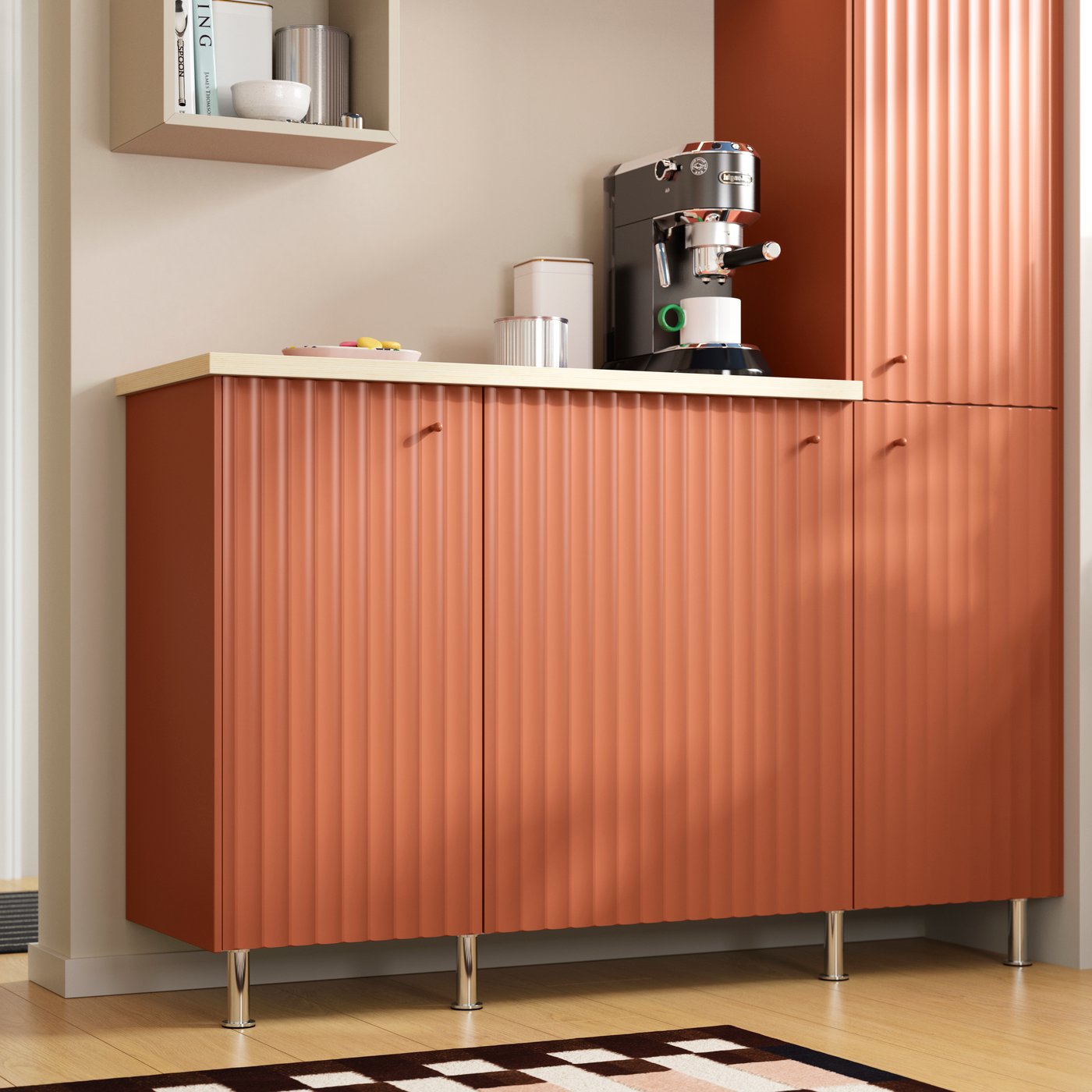Cabinets with TERRSJÖ accent doors in a red-brown wave pattern are mounted to create a small shelf for a coffee maker.
