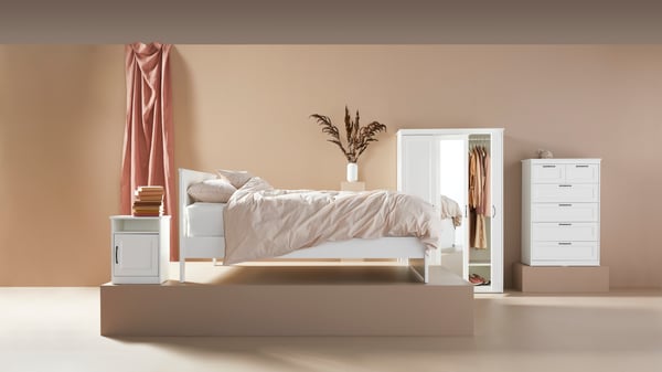 A white SONGESAND bedside table